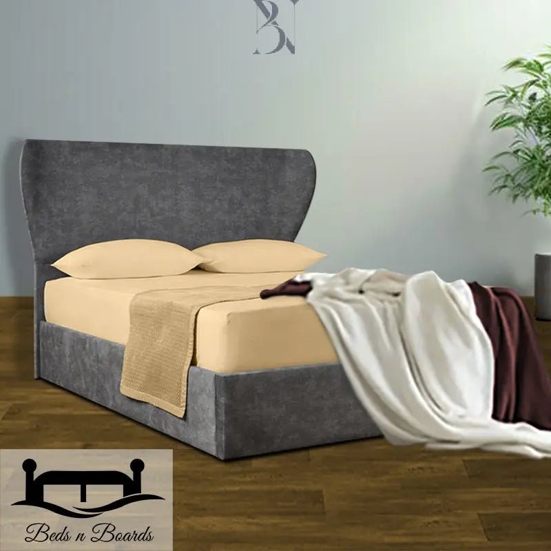 Butterfly Wingback Curved Luxury Bed - BedsnBoards